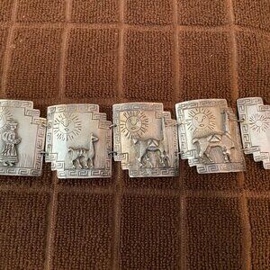 Vintage Peruvian hinged sterling silver bracelet, marked "Peru 925 MF. 5 panels